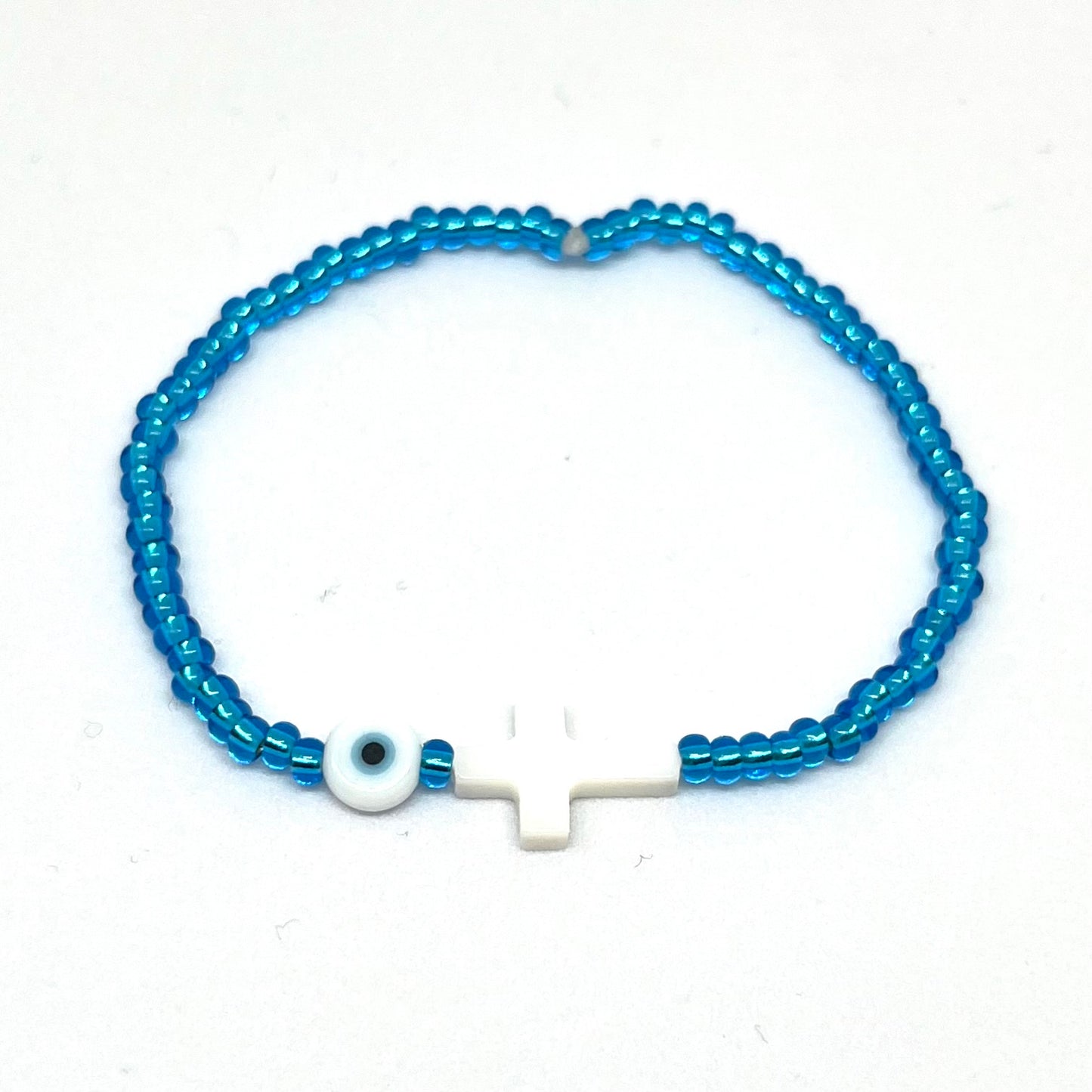 Beaded Bracelet with Shell Cross and Evil Eye