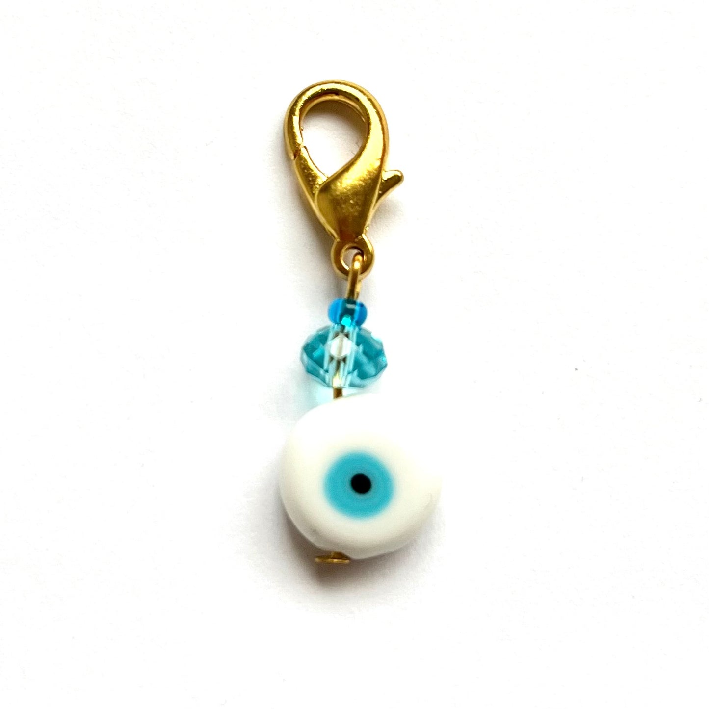 White Evil Eye with Beads good luck charm on a white background